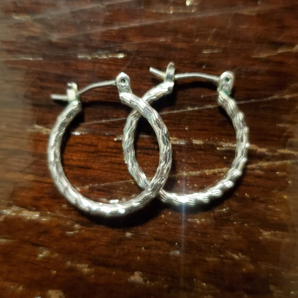 Silver-colored small 3/4 inch diameter textured hoop earrings